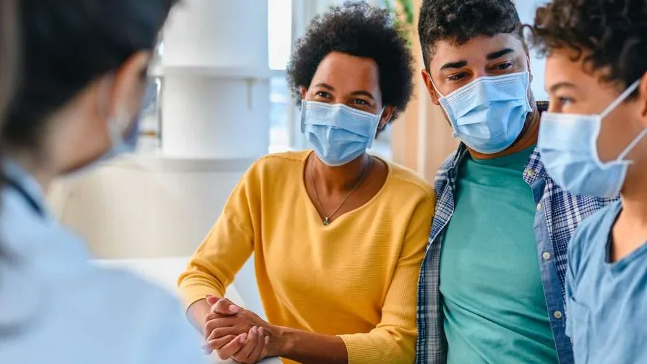 Family wearing masks