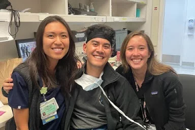 Drs. Duong (2026), Gaw (2024), and James (2024) having fun on shift