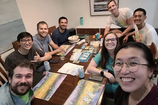 Residents (and their partners) getting together for a board game night (Class of 2025-2027)