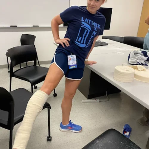 Dr. Brown (2025) showing off fresh splints from the IBC splinting workshop.