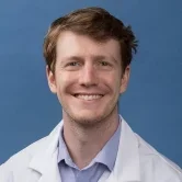 Headshot of Brainard Burrus