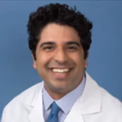 Headshot of Dr. Reza Hassabi